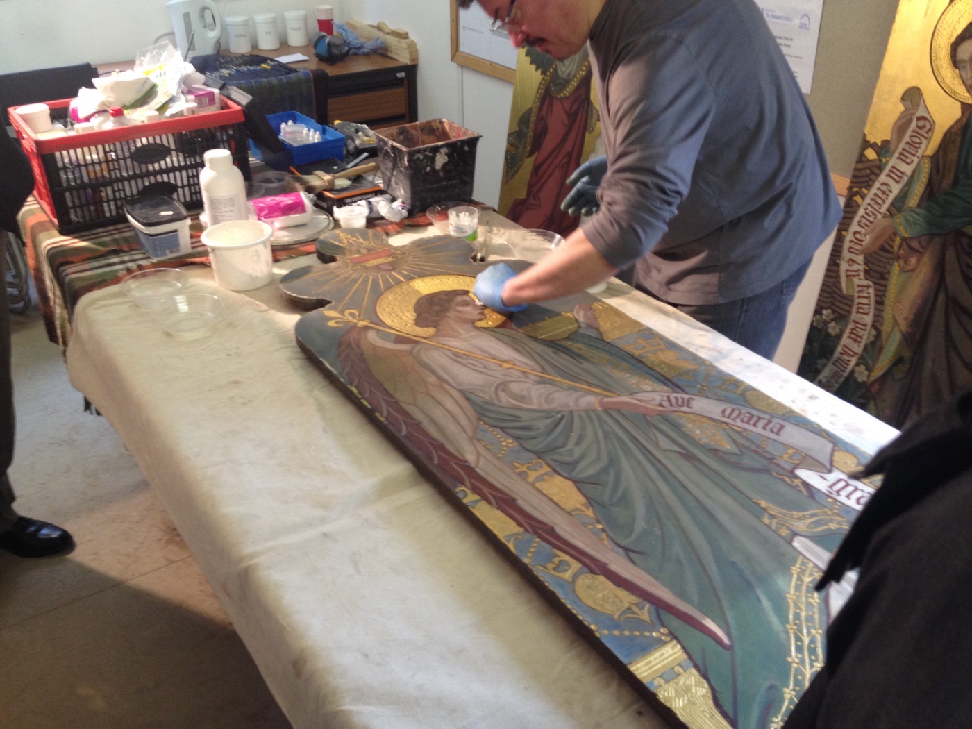 Silvano Cioci-Faux restoring an altar painting during a workshop at St Marie's Church, Widnes