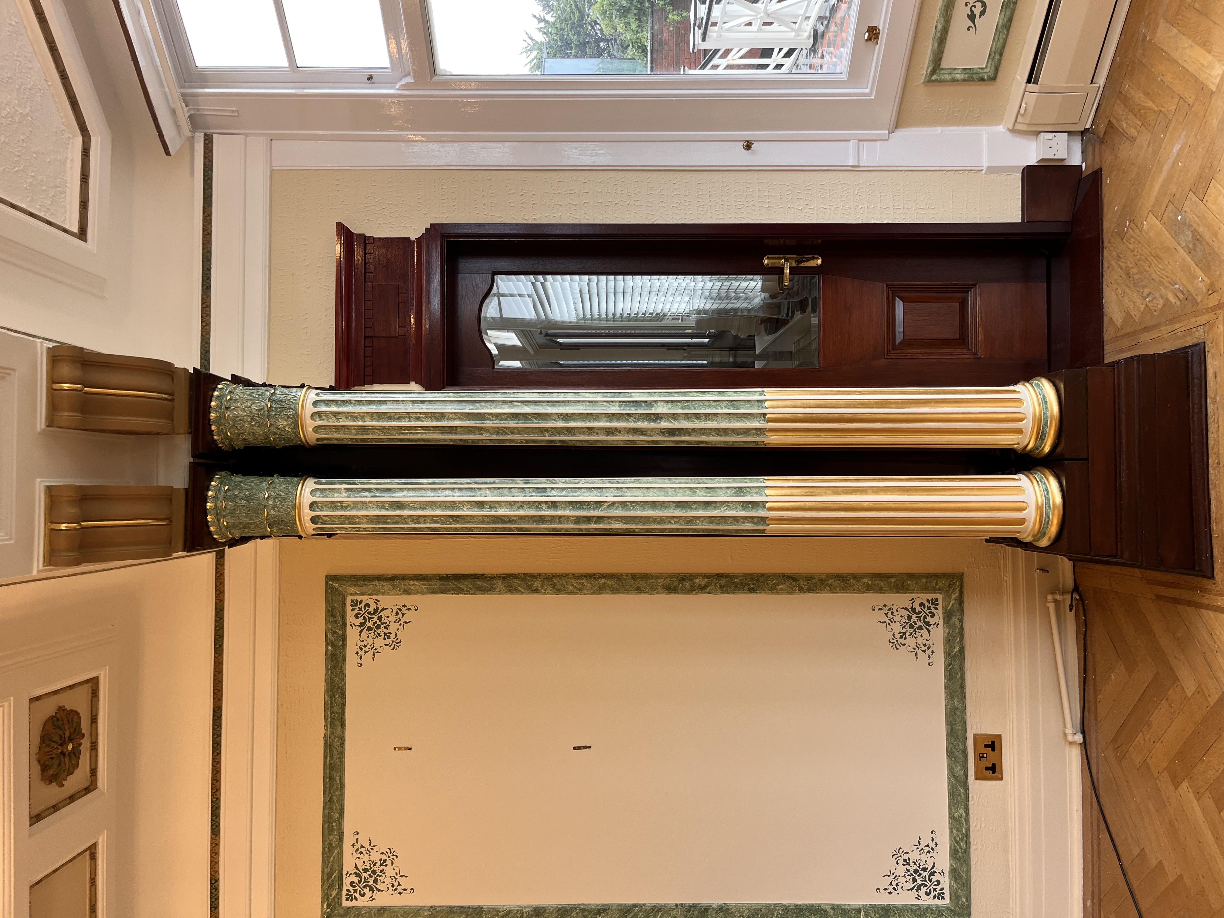 Faux marble and gilded columns in a Victorian mansion, Cheshire